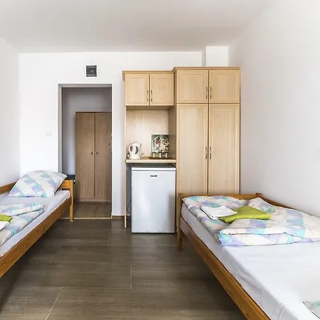 Pokoje Goscinne Przy Gospodzie Habitación en casa particular *