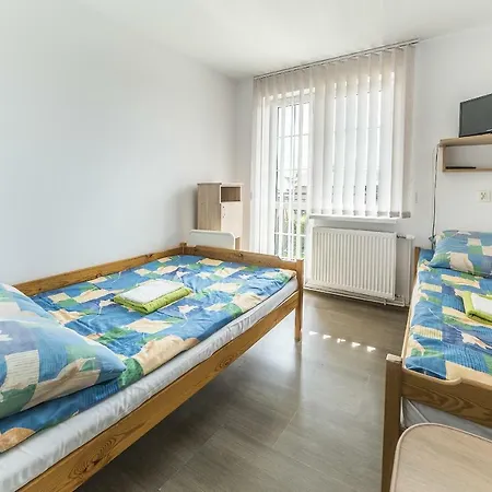 Pokoje Goscinne Przy Gospodzie Habitación en casa particular