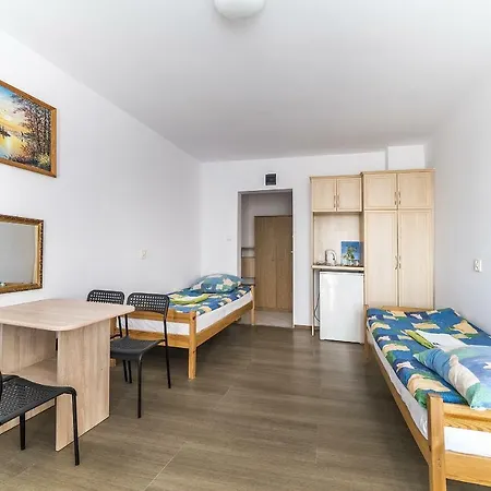 Pokoje Goscinne Przy Gospodzie *